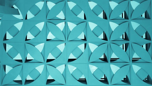这款抽象几何蓝色图案以重复的方形和叶子形状为特色，非常适合现代背景