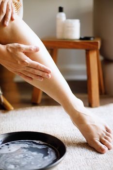 A relaxing skincare routine featuring handcrafted natural soaps and lotions in a calm setting.