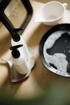 Aesthetic flatlay of artisan skincare products with modern apothecary style.