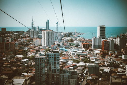 Captivating aerial view of Batumi's skyline against the serene Black Sea backdrop.