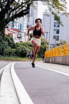 Determined female athlete sprinting on urban pathway in Colombia. Capturing strength and motion.