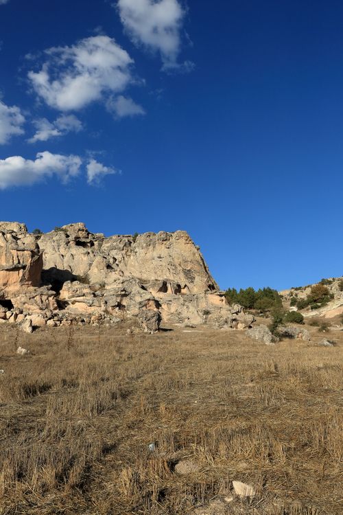 Free Explore this breathtaking rocky landscape under a bright blue sky, perfect for adventure enthusiasts. Stock Photo