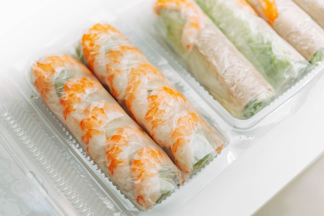 Fresh Vietnamese Spring Rolls in Packaging · Free Stock Photo