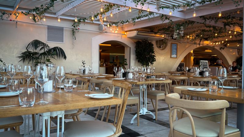 Elegant restaurant dining room with set tables