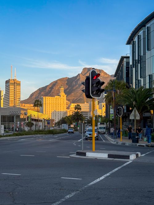Free Urban view of Cape Town featuring Table Mountain and city life at sunset, South Africa. Stock Photo