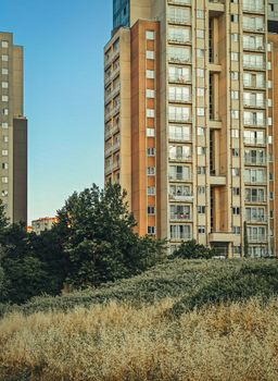 Urban landscape of modern apartment complexes in Istanbul during the day.