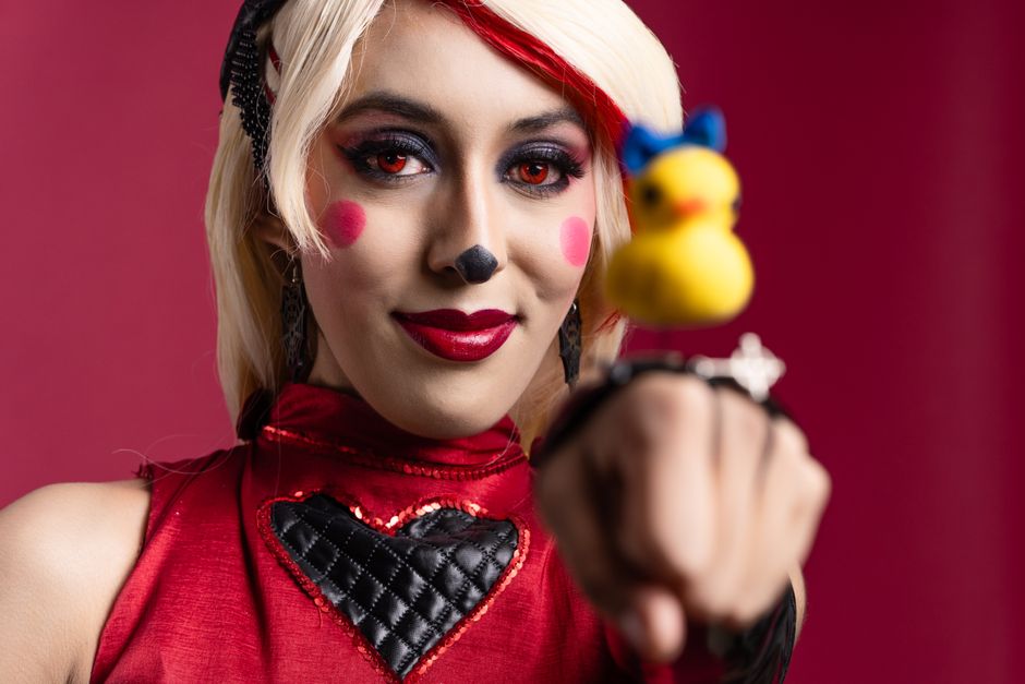 A vibrant cosplay portrait featuring artistic makeup and anime character inspiration, set in Mexico City.