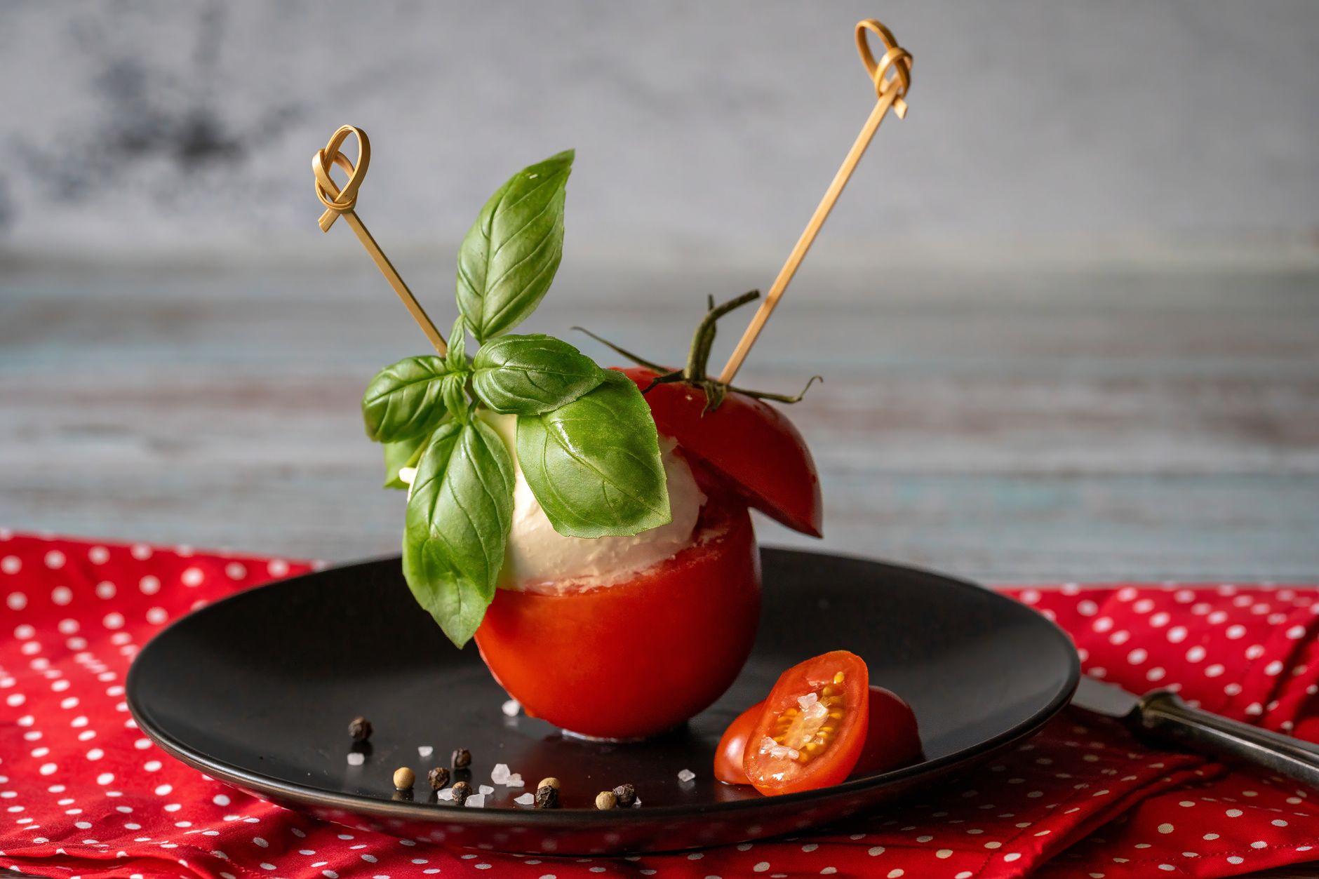 Caprese burger with melted mozzarella and pesto mayo
