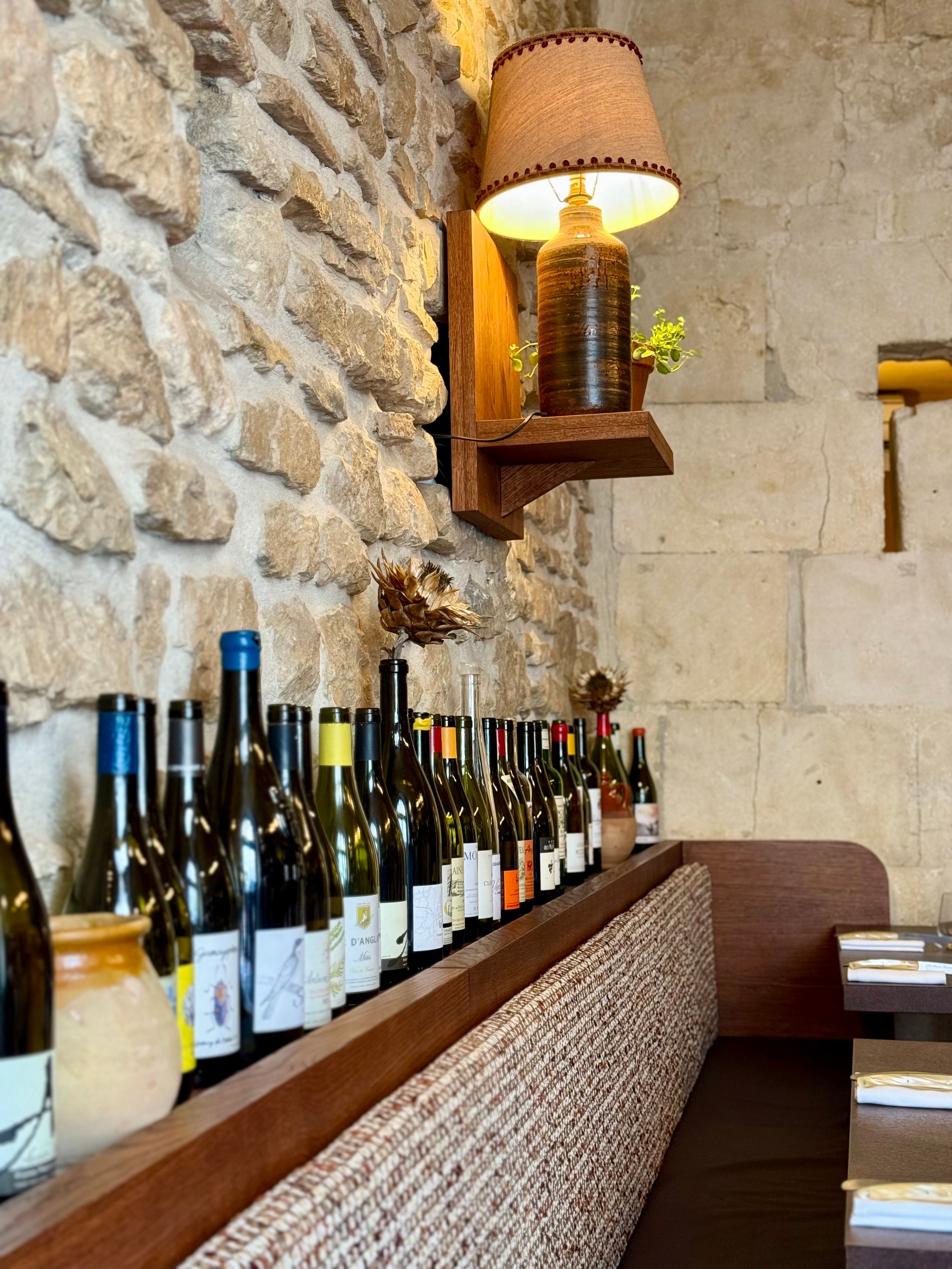 Rustic Wine Display in French Diner · Free Stock Photo