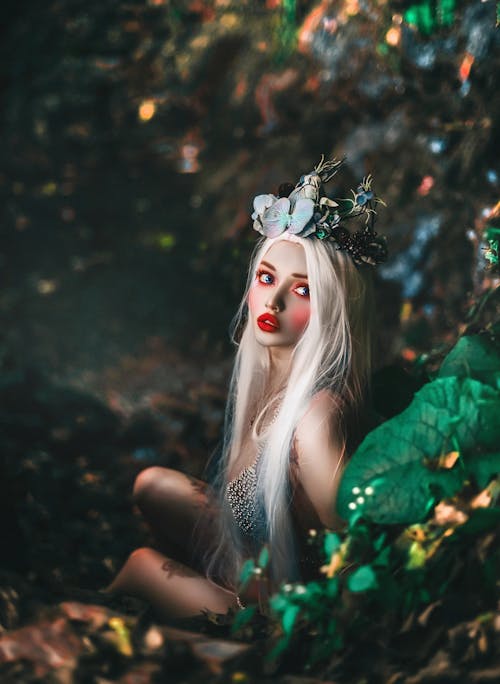 Selective Focus Photography of Woman Wearing Crown