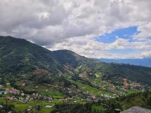 Free A breathtaking aerial view of a lush mountain village in Nepal. Stock Photo