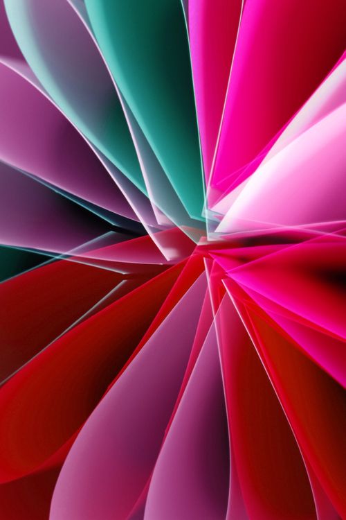 Free Vibrant abstract art featuring colorful paper shapes in pink and teal hues. Stock Photo