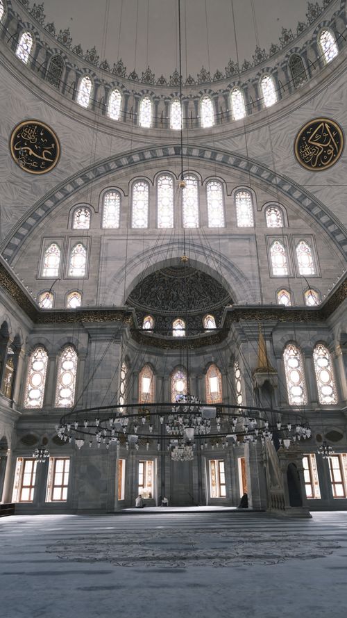 Free Explore the breathtaking interior architecture of a historical mosque in Istanbul, showcasing intricate dome and window designs. Stock Photo