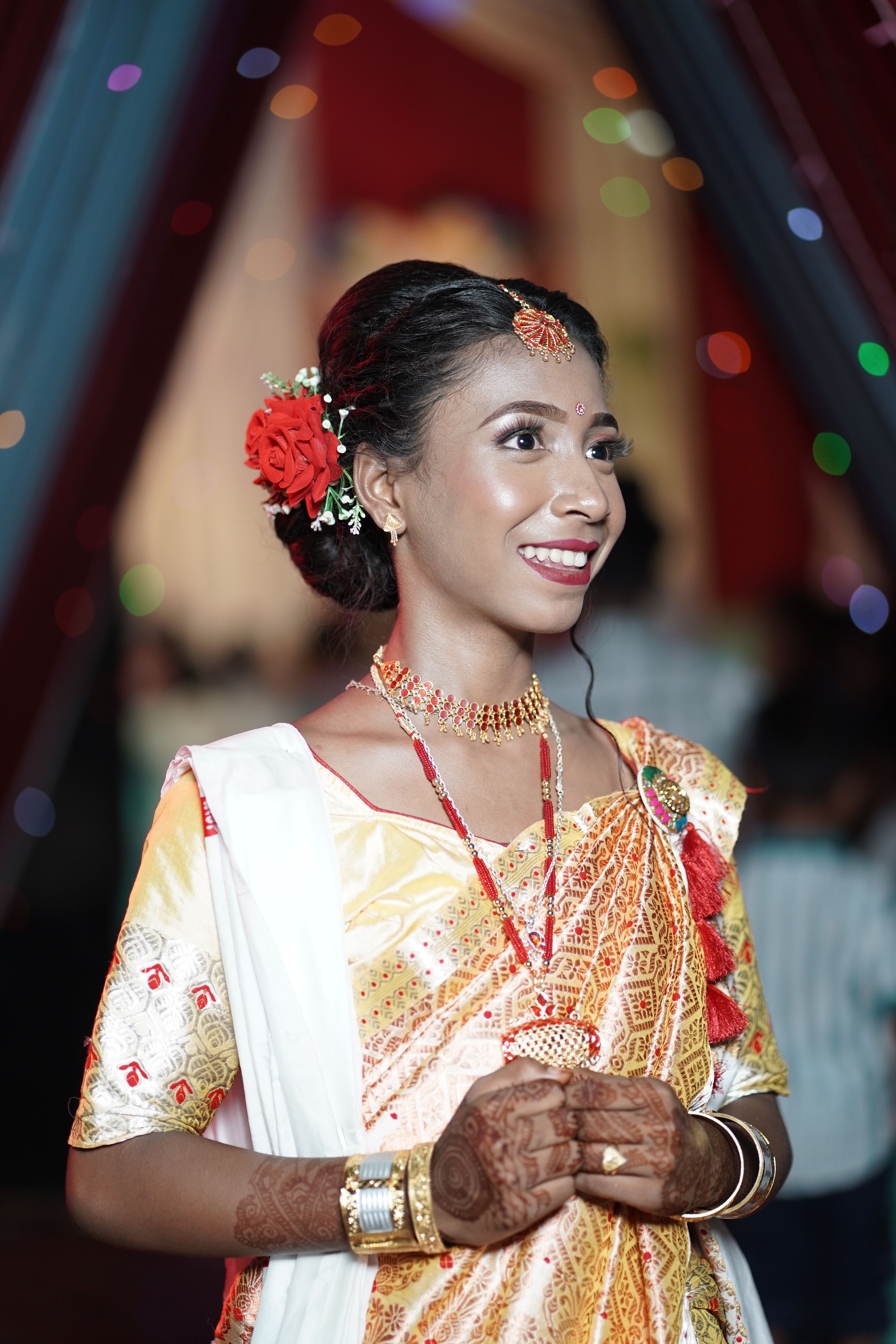 Smiling Woman in Traditional Indian Wedding Attire · Free Stock Photo