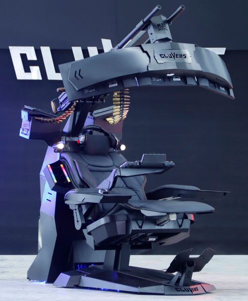 Free High-tech gaming chair with multiple screens and ergonomic design for immersive gaming experience. Stock Photo
