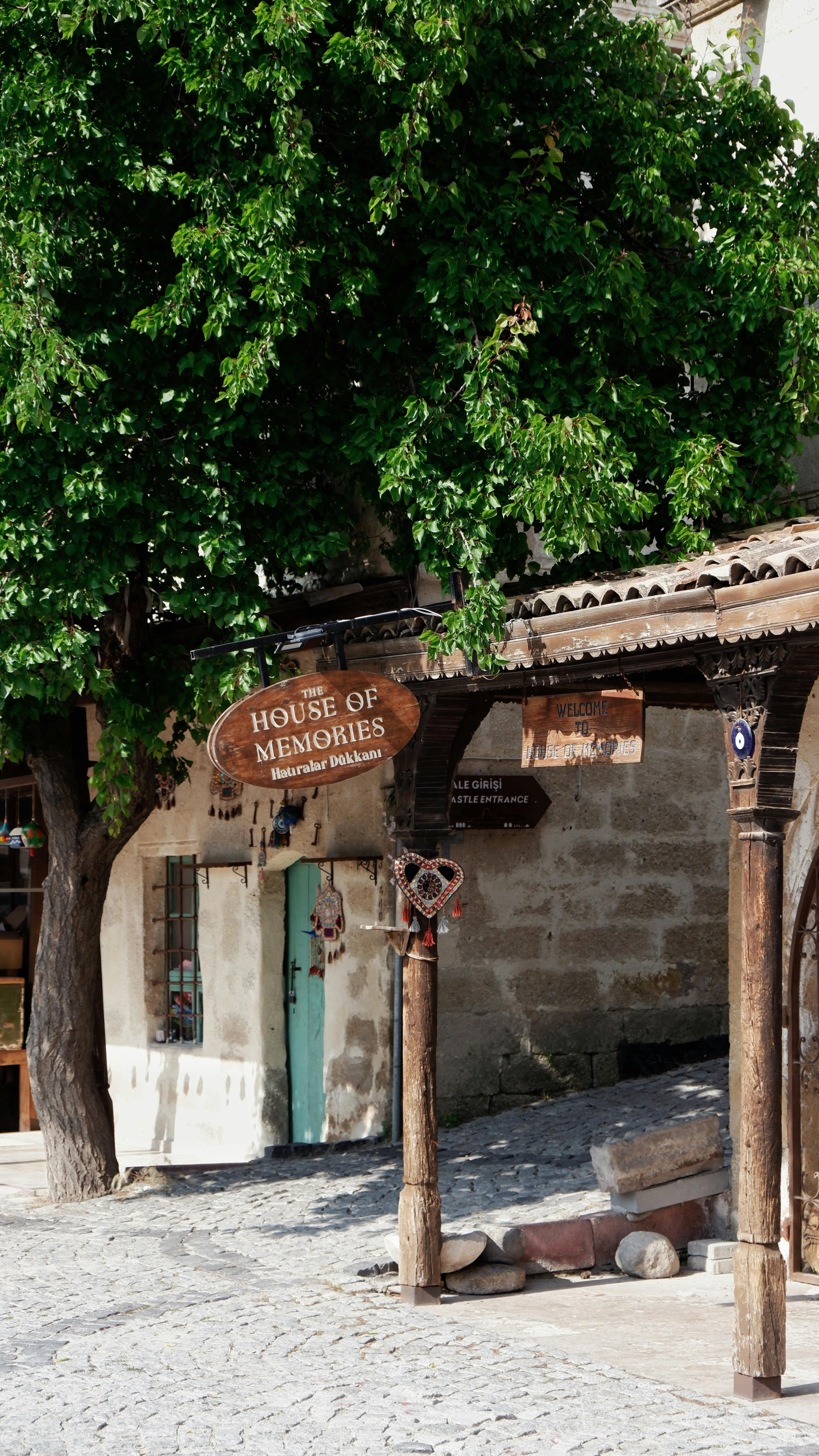 Charming Rustic Storefront in Sunny Village · Free Stock Photo