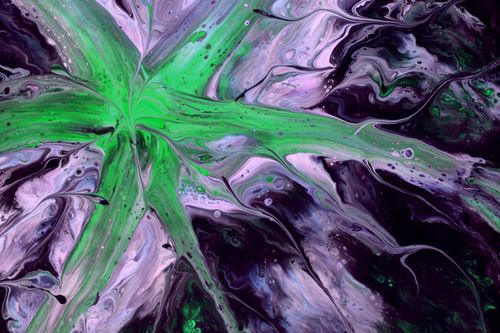 Free Dynamic abstract fluid art with vibrant green and purple swirls creating a mesmerizing pattern. Stock Photo