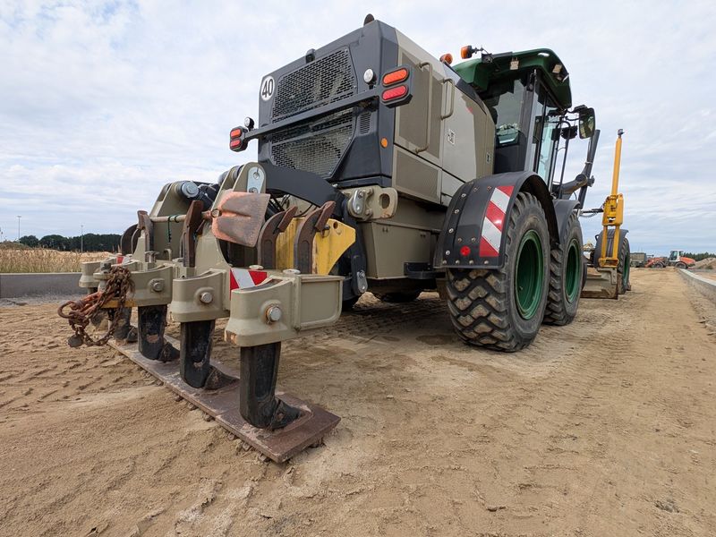 Heavy equipment clearing and grading a commercial construction site