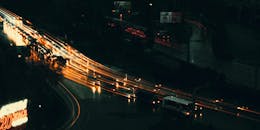 Long-exposure Photograph of Vehicles on the Road