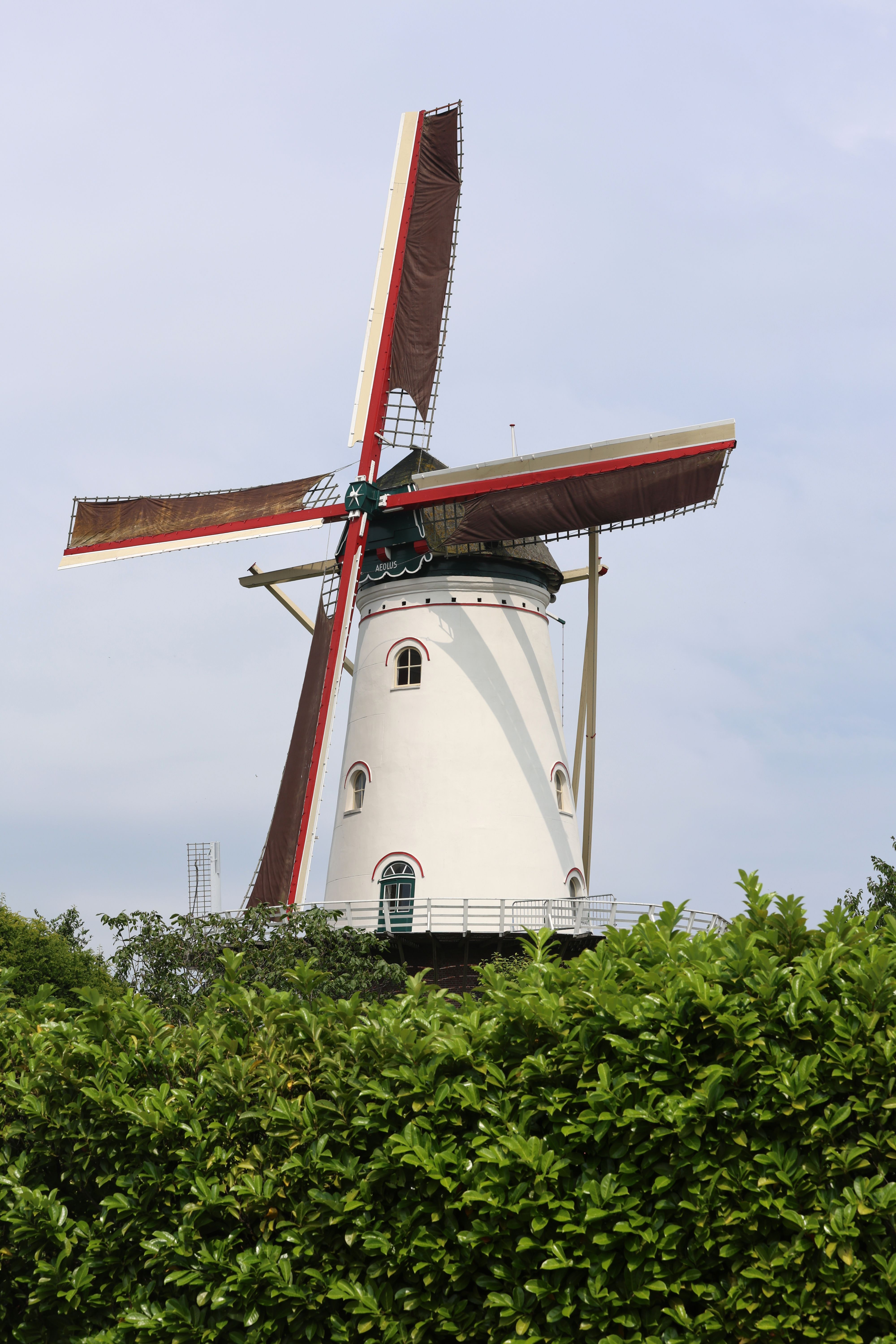 Historic Dutch Windmill Against Blue Sky · Free Stock Photo