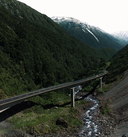 Free stock photo of bridge, grass, mountains Stock Photo