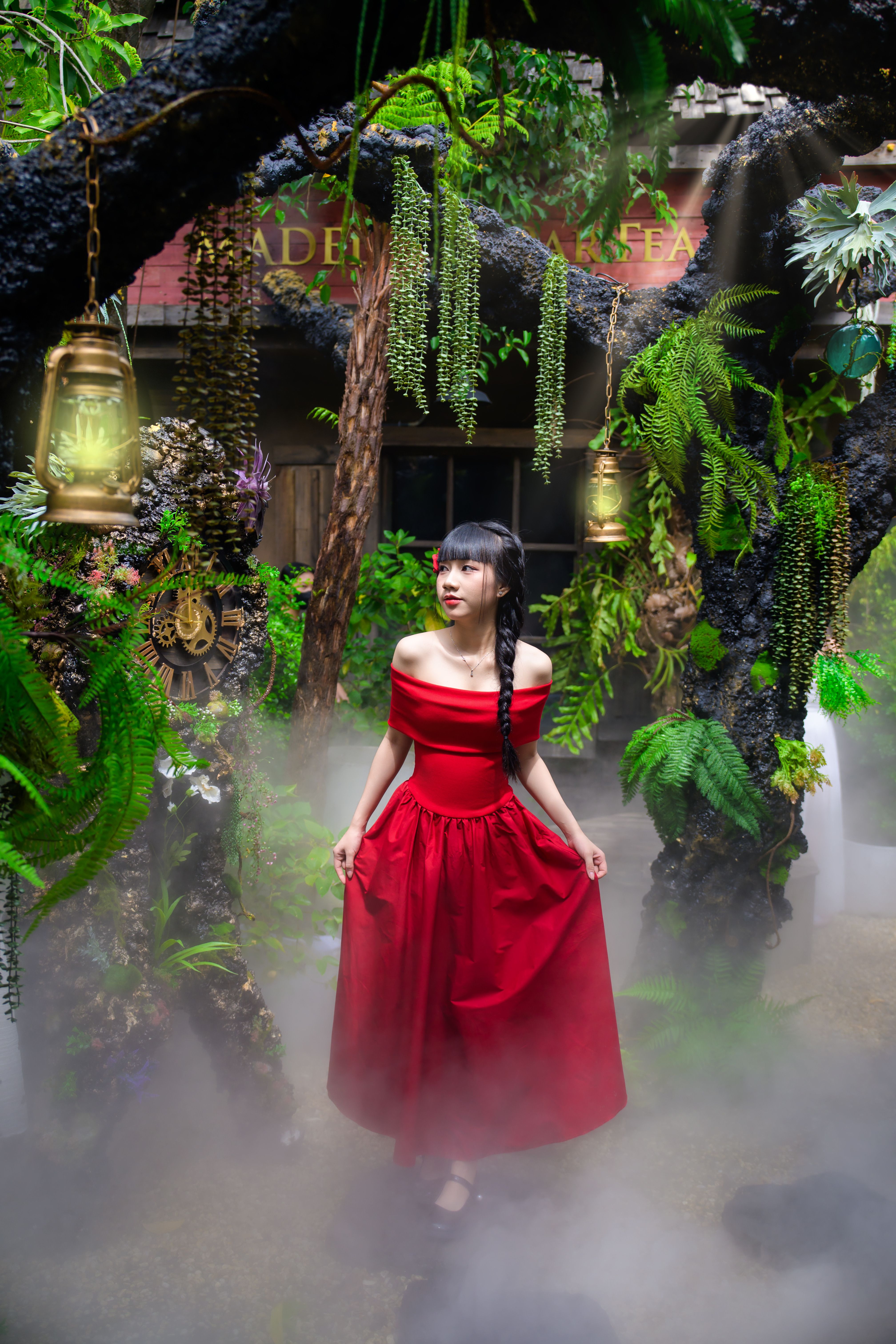 Enchanting Woman in Red Dress Amidst Mystical Forest · Free Stock Photo