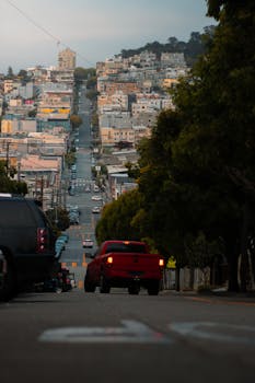 A cinematic view of San Francisco's iconic steep streets with urban landscape.