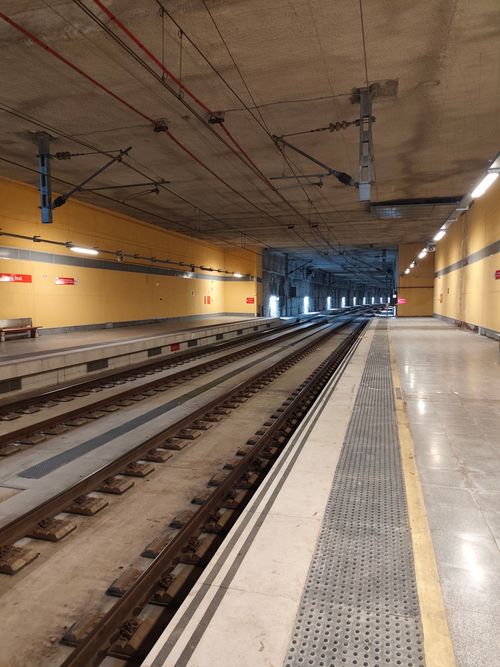 Free Deserted train station platform in Puerto Real, Andalucía, showcasing railway infrastructure. Stock Photo