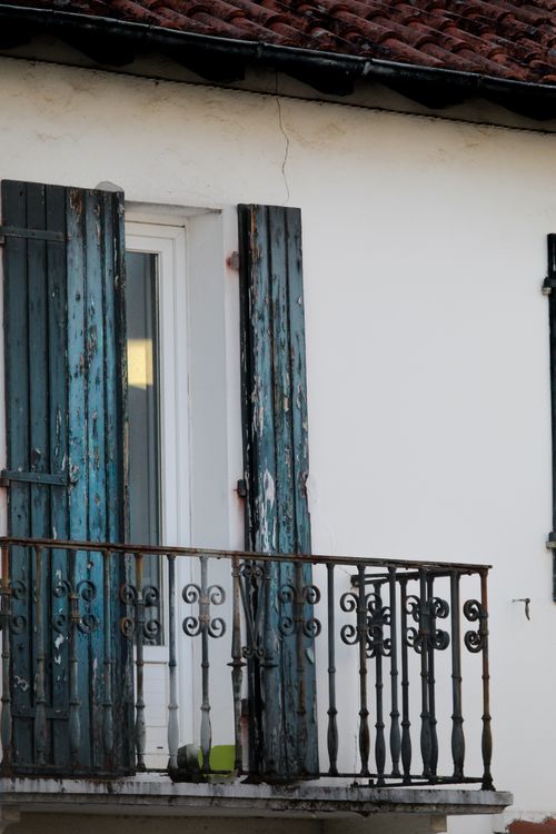 Free Explore the rustic charm of a weathered balcony in Hendaye, Nouvelle-Aquitaine, France. Stock Photo
