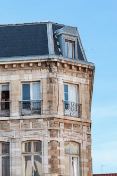 Close-up of a historic building exterior in Hendaye showcasing beautiful architectural details.