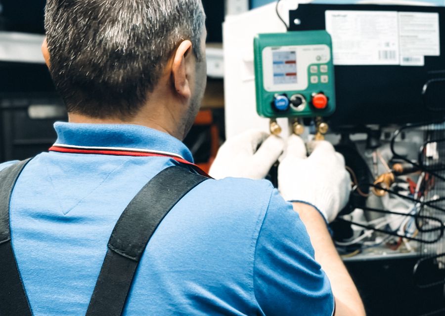 Technician working on an HVAC system
