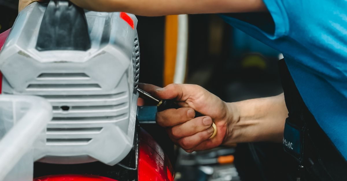 Fixing Machine Compressor Technician Repairing Industrial Air Compressor · Free Stock Photo