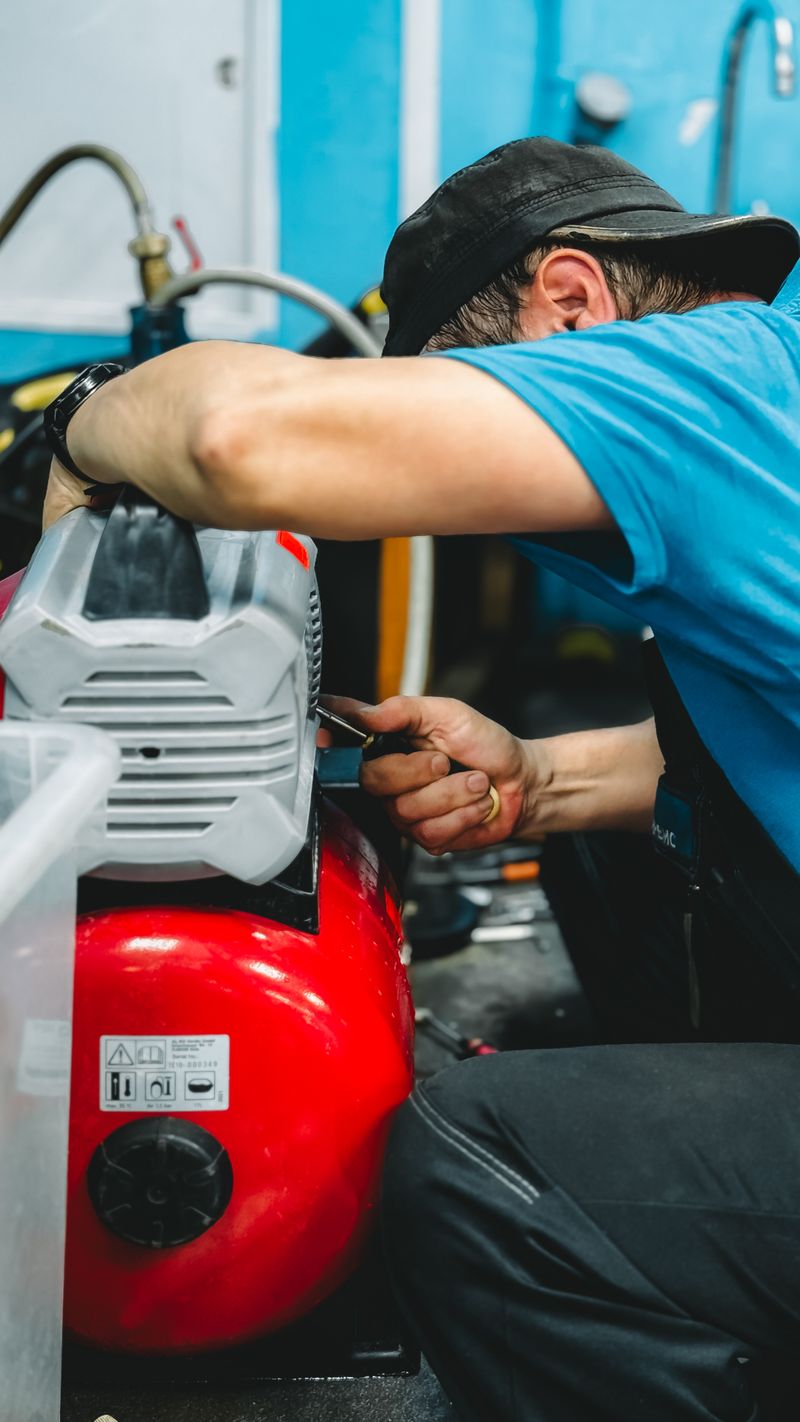 Technician checking pressure system