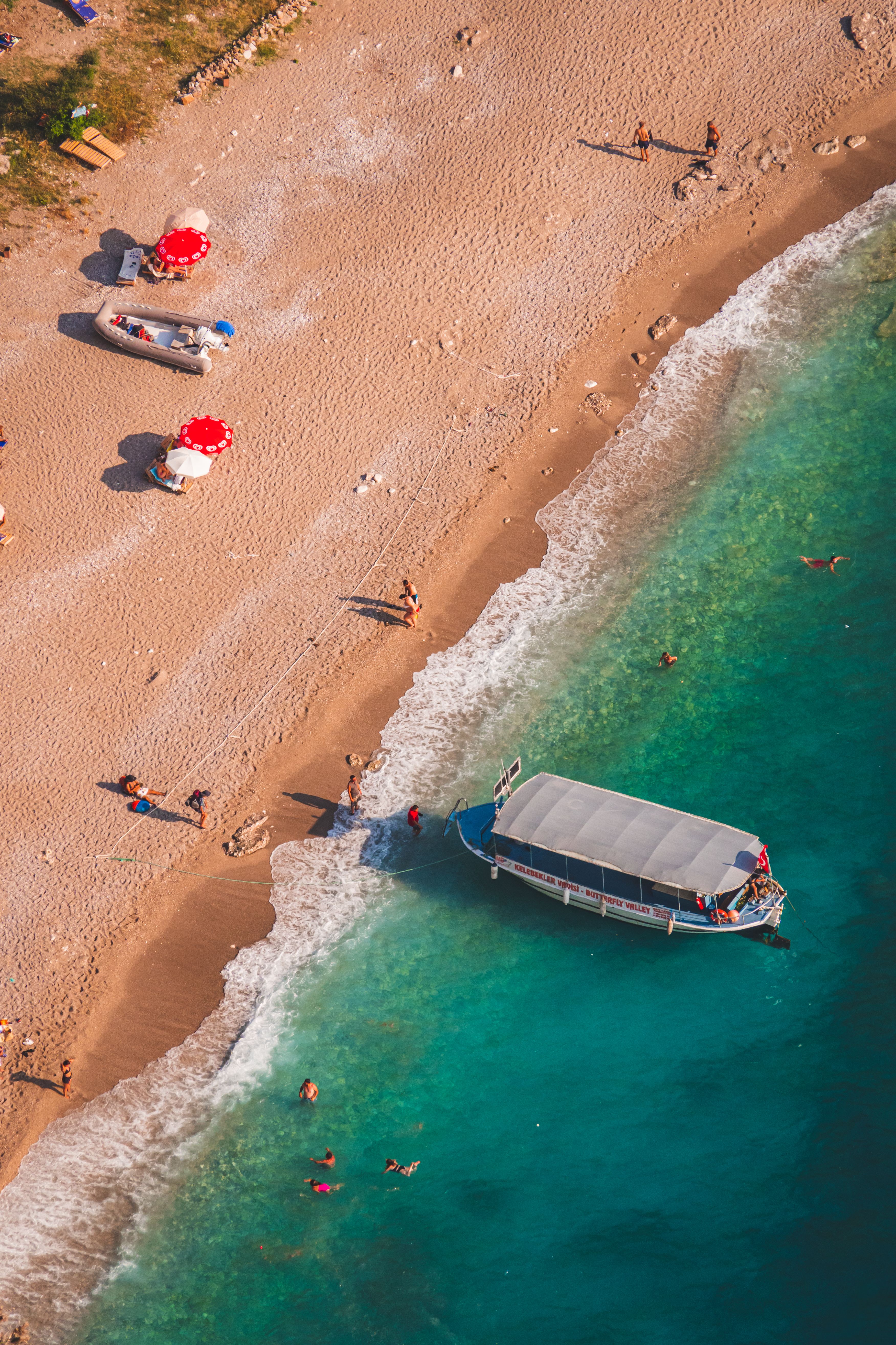Aerial View of Beach in Muğla with Tour Boat · Free Stock Photo
