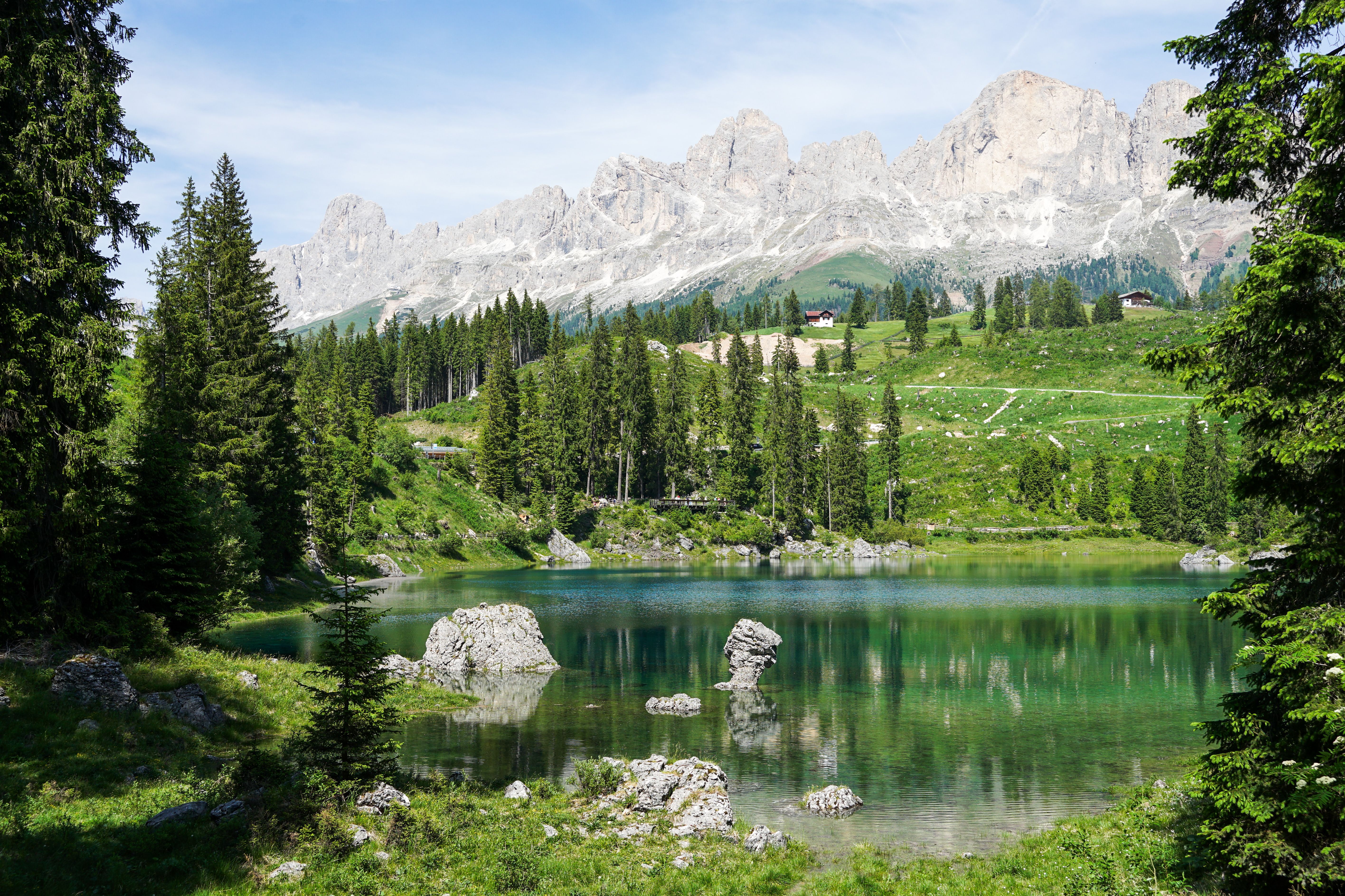 Scenic view of alpine lake with mountains · Free Stock Photo