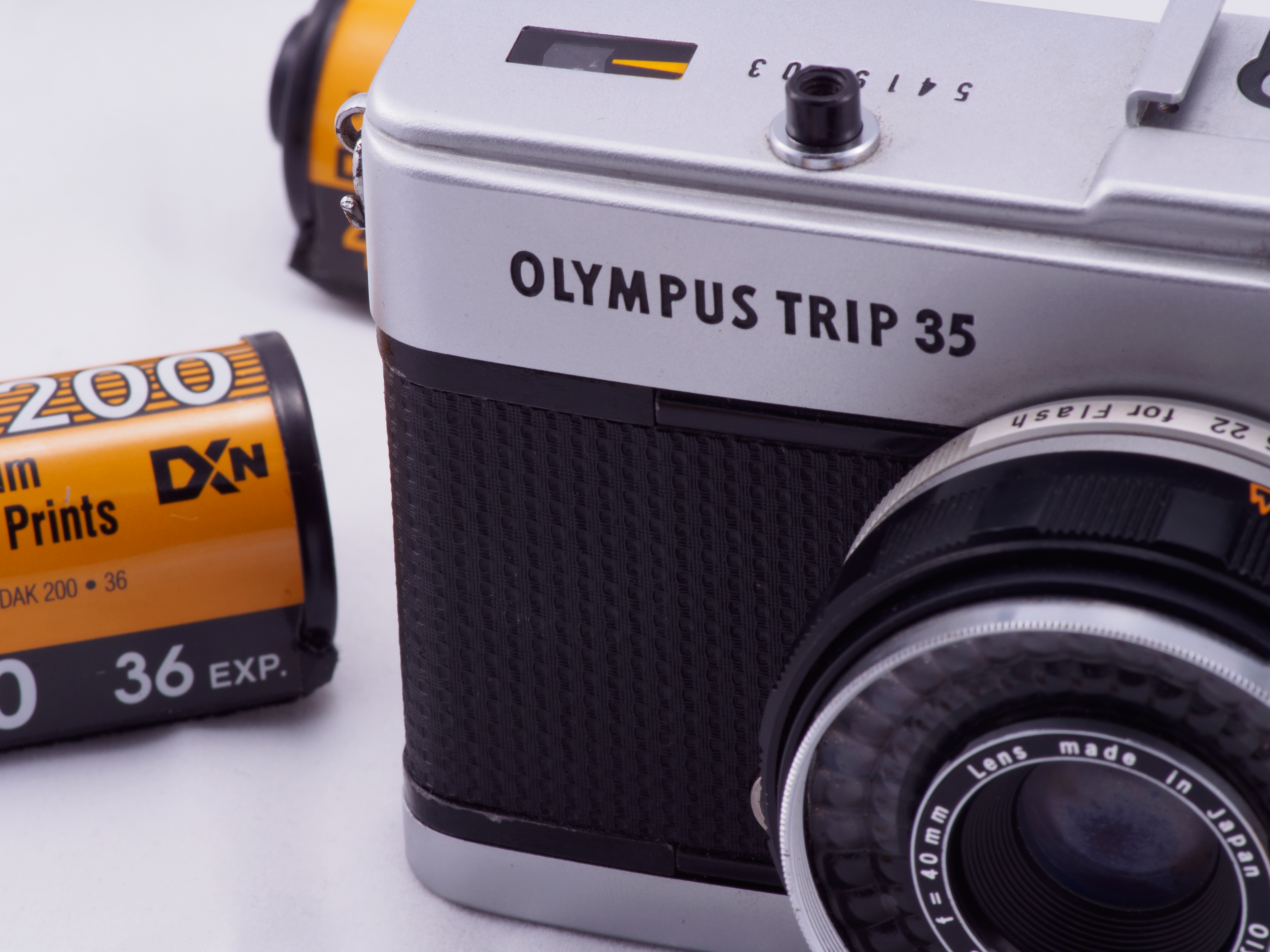 Vintage Olympus Trip 35 with Kodak Film Rolls · Free Stock Photo
