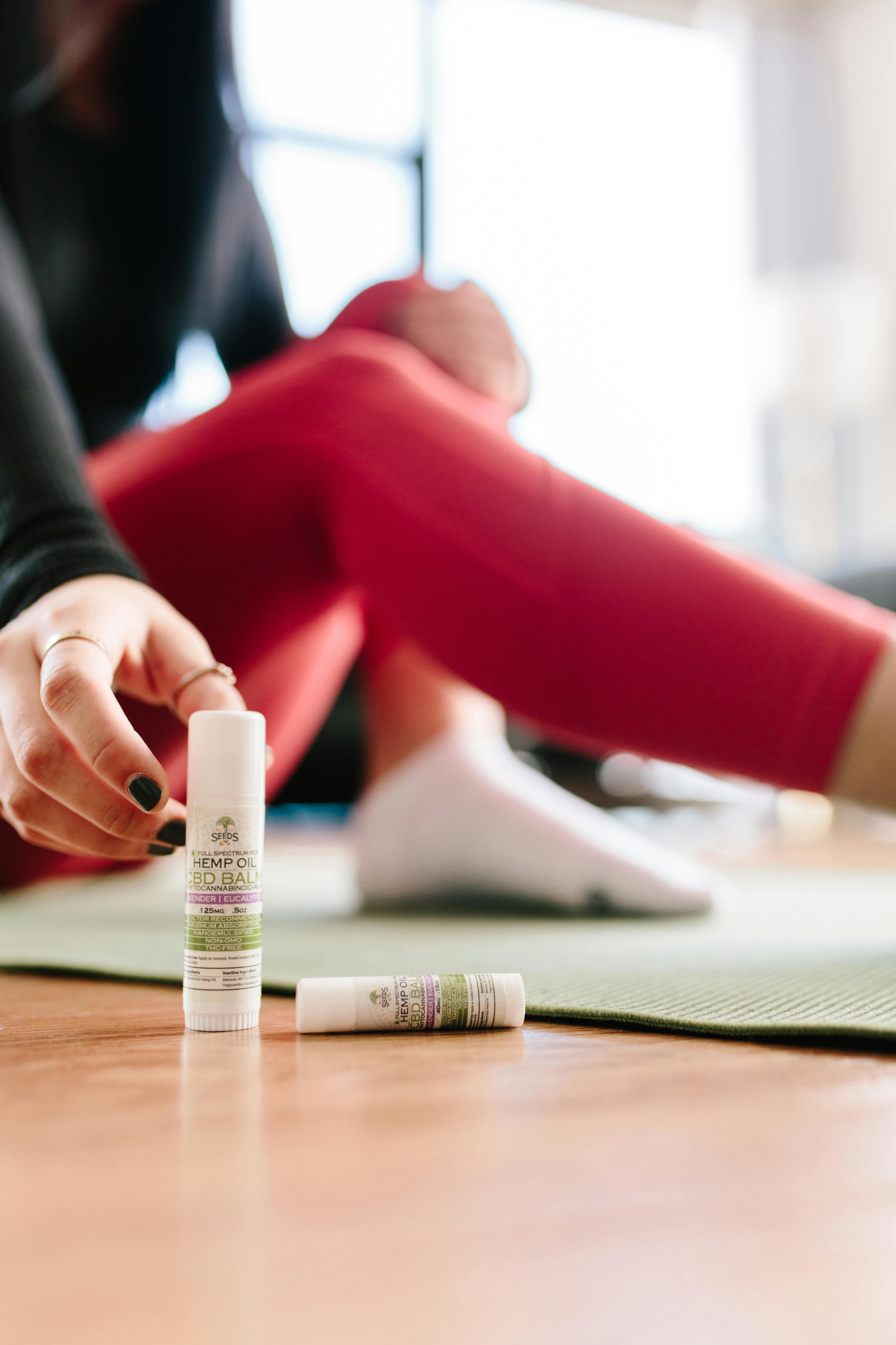 Woman Reaching For CBD Product \u00b7 Free Stock Photo