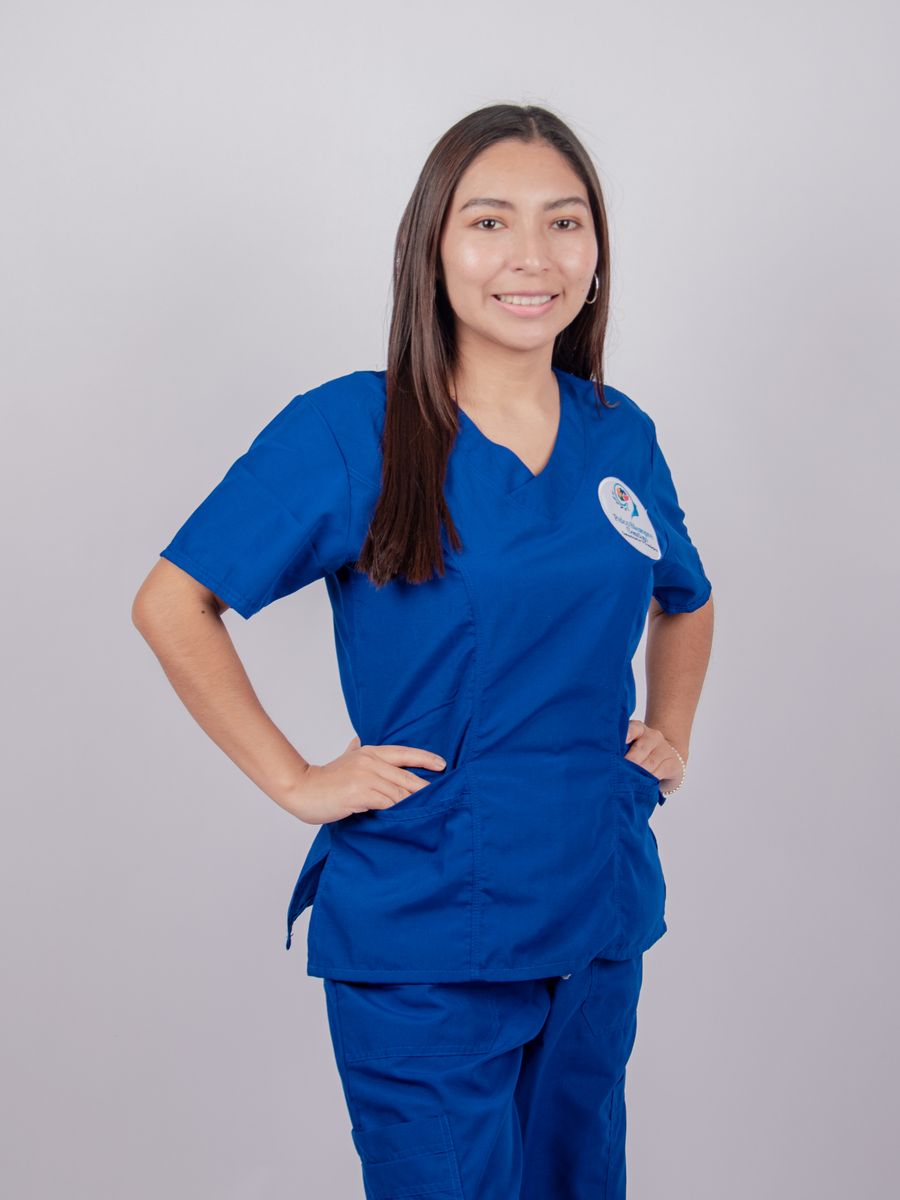 Female medical professional wearing apricot scrubs