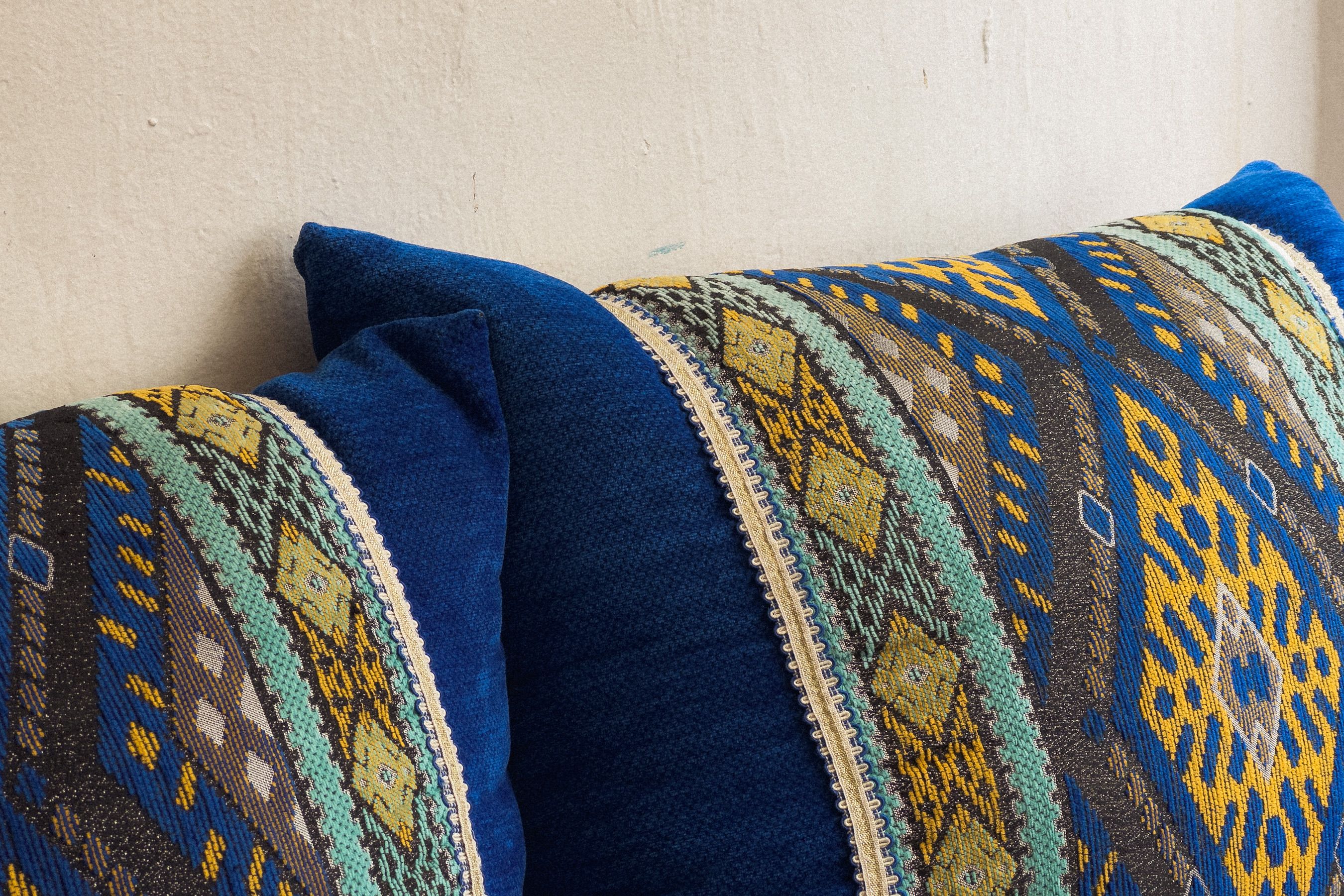 Fresh Look at Close Up Of Blue Patterned Throw Pillows With Textures