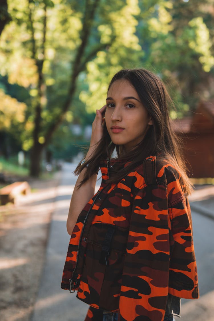 Photo Of Woman Wearing Camouflage Jacket
