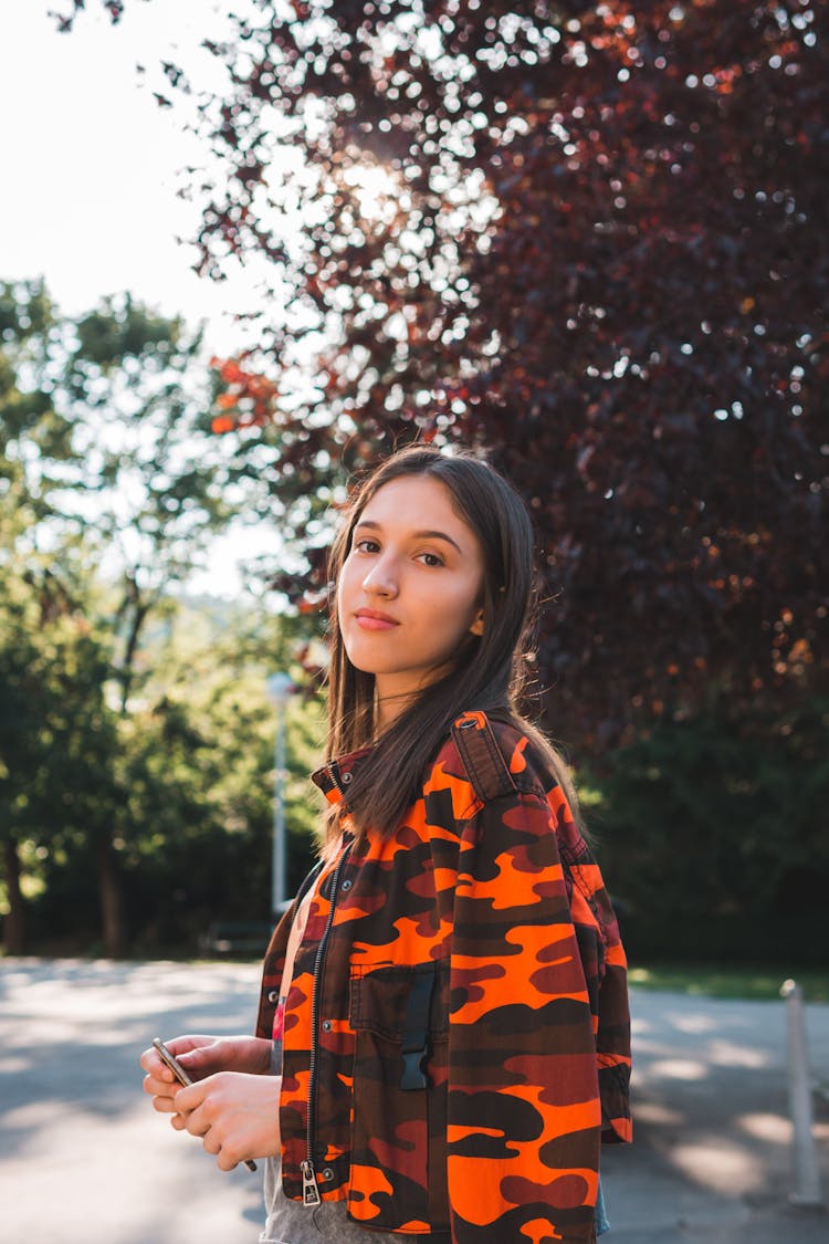 Photo Of Woman Wearing Camouflage Jacket