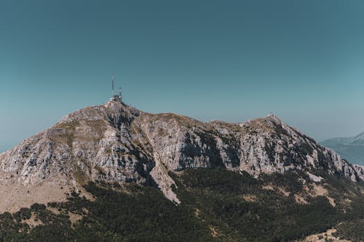 Scenic view of Mount Lovćen in Cetinje, Montenegro under clear skies. by Vito Vidović