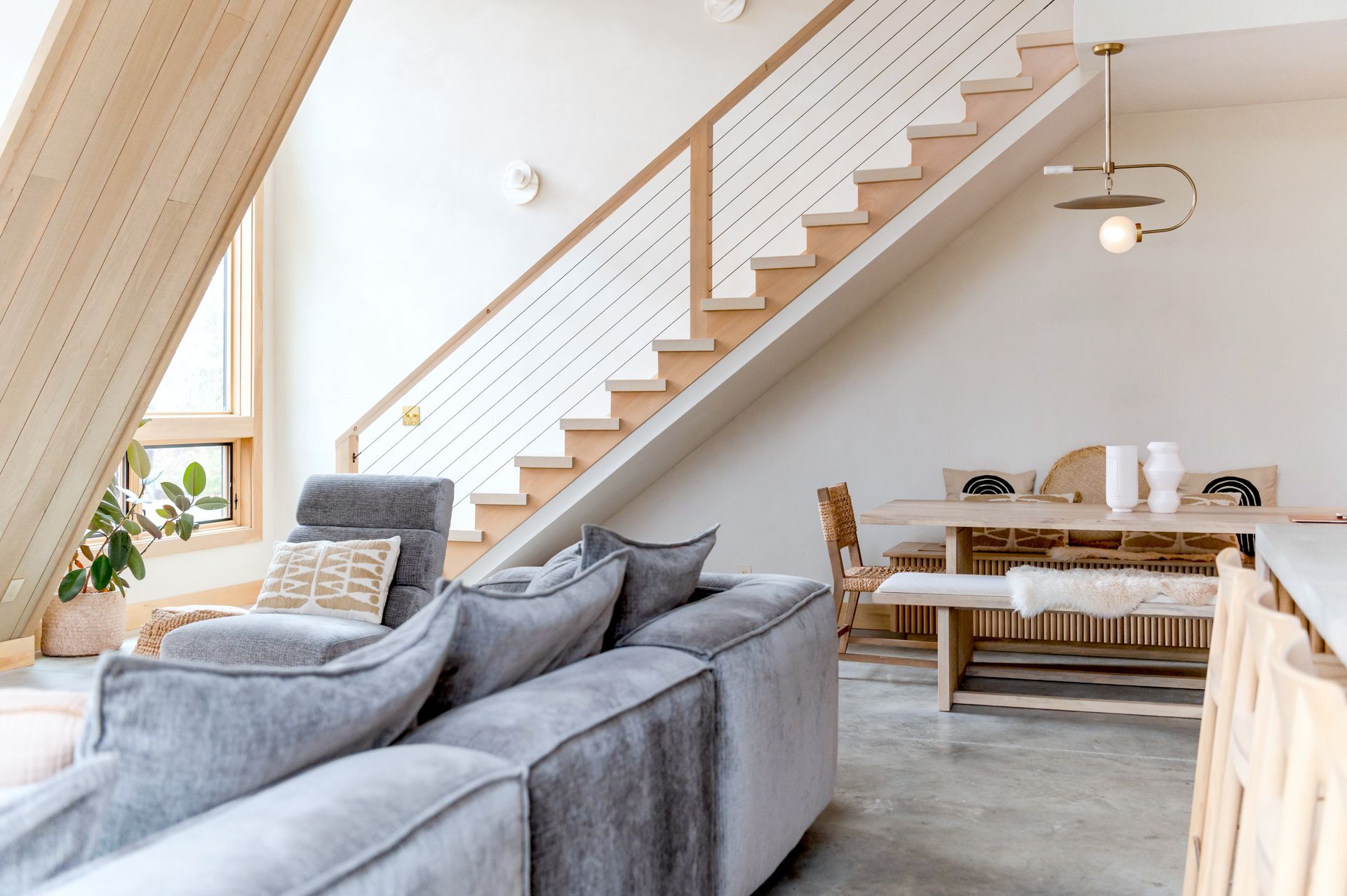 Stylish and cozy modern living room interior with elegant decor in Bethel, Maine.