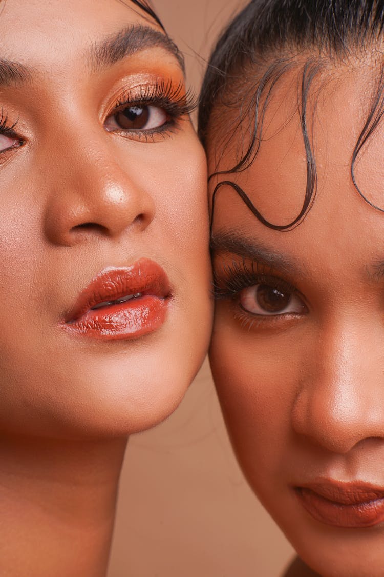 Close Up Photo Of Two Women