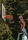 Man Shooting the Ball Backwards