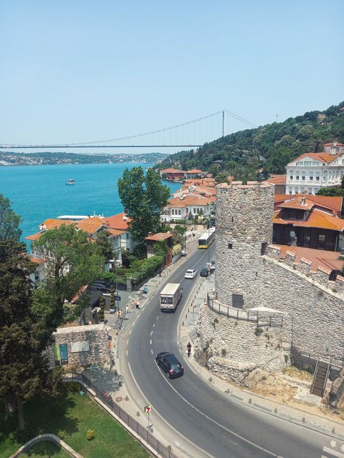 Free A captivating aerial view of Rumeli Fortress by the Bosphorus Bridge in Istanbul. Stock Photo