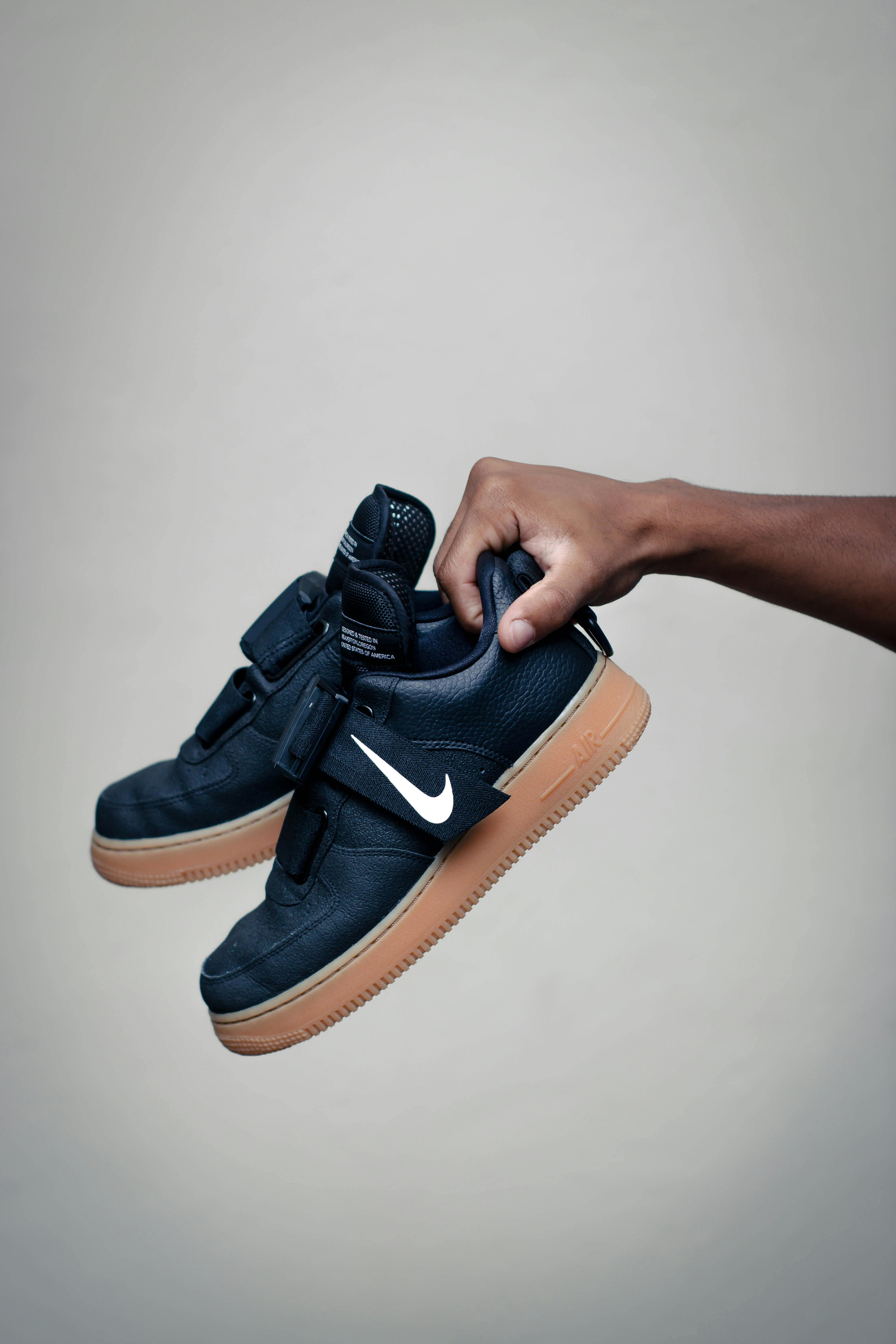 Black and brown nike high top sneakers photo – Free Apparel Image on  Unsplash