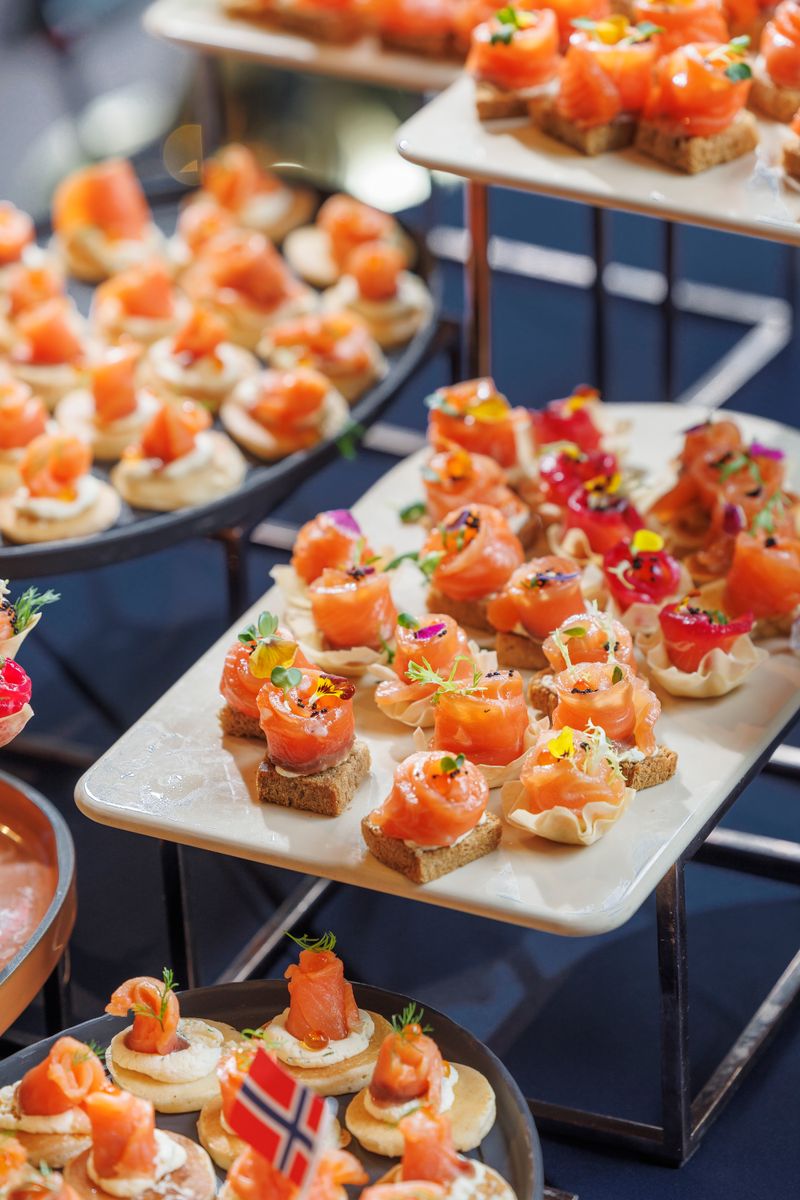 Salmon canapes arranged for a buffet