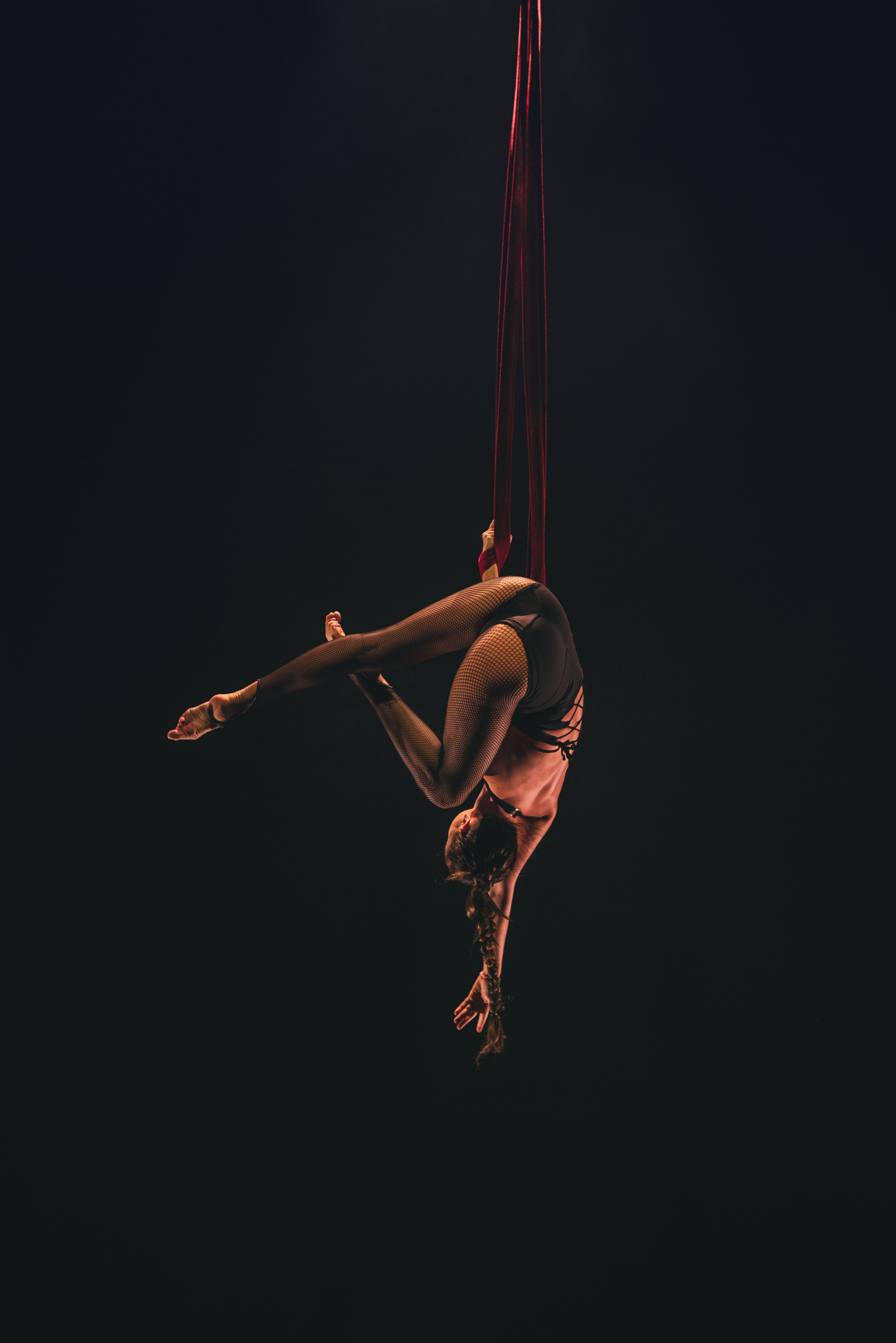 Graceful Aerial Acrobat Performing on Silk · Free Stock Photo