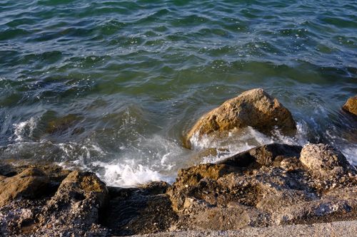 Free Waves crashing against the rocky coast of Foça, İzmir, Türkiye. Stock Photo